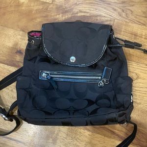 Black Coach Women’s Backpack.